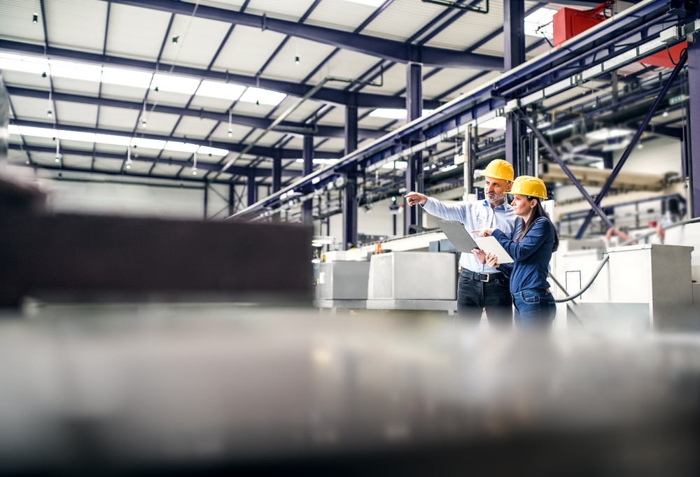 Two project managers modernizing a facility.