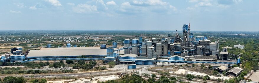 Cement,Manufacturing,Plant,Aerial,View,With,Industrial,Complex,And,Highway